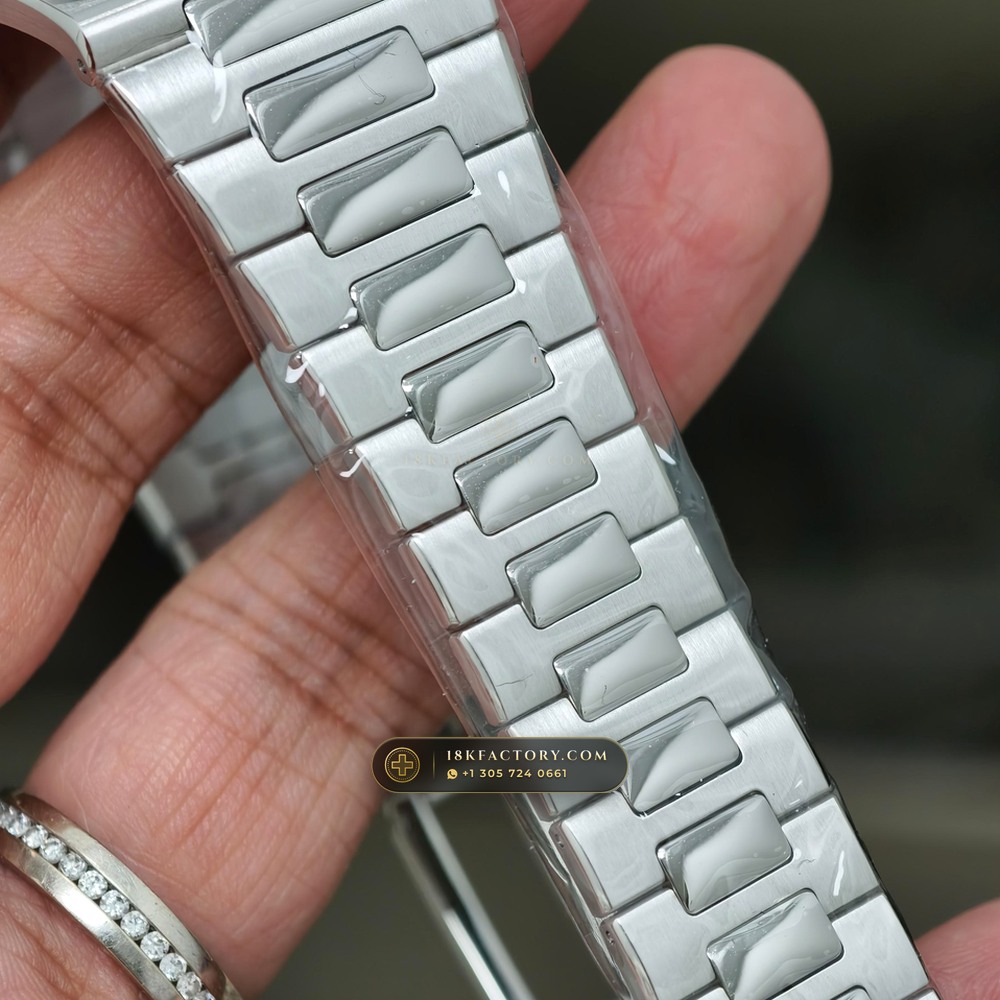 Patek Philippe Nautilus Off-Catalogue Baguette Ruby Bezel 950 Platinum Ref. 5711/112P-001 — XRF Certified Edition — Studio Gallery Plate X in 950 Platinum Pt950 (245.4g Verified Mass, Patek Philippe Cal. 26-330 S C / Cal. 324 S C - 21K Gold Rotor)